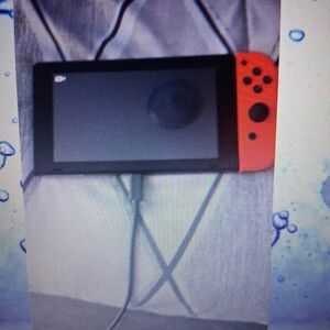 Nintendo Handheld Console with Red Controller